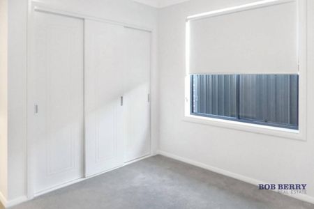 Tucked-Away Modern 3-Bedroom Home in Southlakes Estate - Photo 2