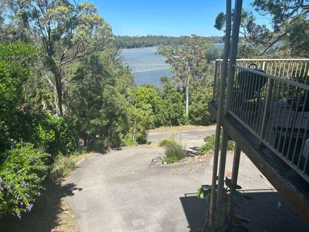 Spacious home surrounded by a leafy oasis with water views - Photo 5