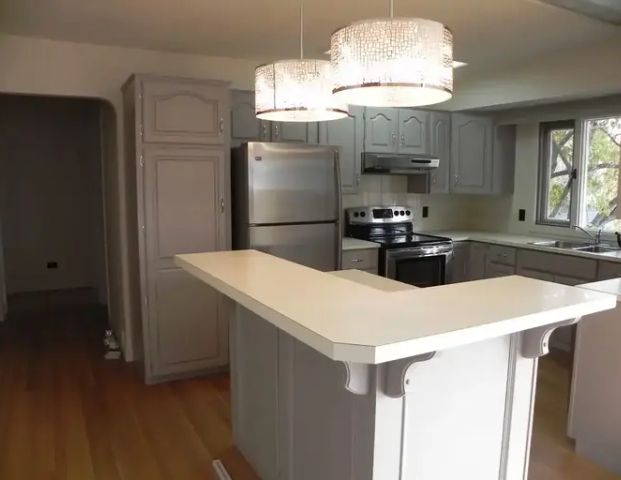 4 BR + den bungalow in Parkdale | Calgary - Photo 1