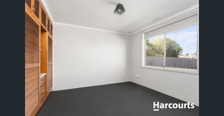 Centrally Located Unit with a Carport! - Photo 3