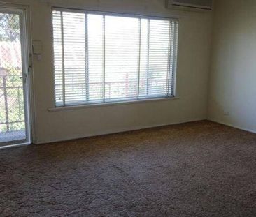 Spacious Upstairs Unit in Prime Location - Photo 2