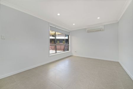 TASTEFULLY RENOVATED HOME WITH AMPLE PARKING AND STORAGE - Photo 5