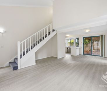 Walk to Bellevue Park State School – Gated 'Benowa Lodge' Living - Photo 1