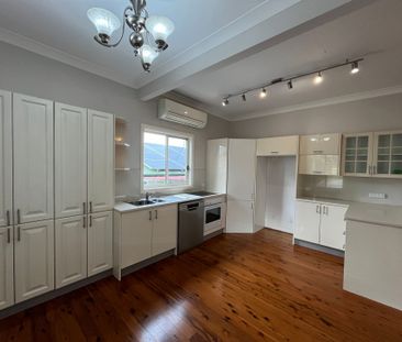 Three Bedroom Home with Sunroom - Photo 6