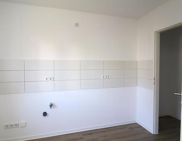 Kleine, gemütliche 2-Zimmer-Wohnung im Siedlungshaus - Foto 1