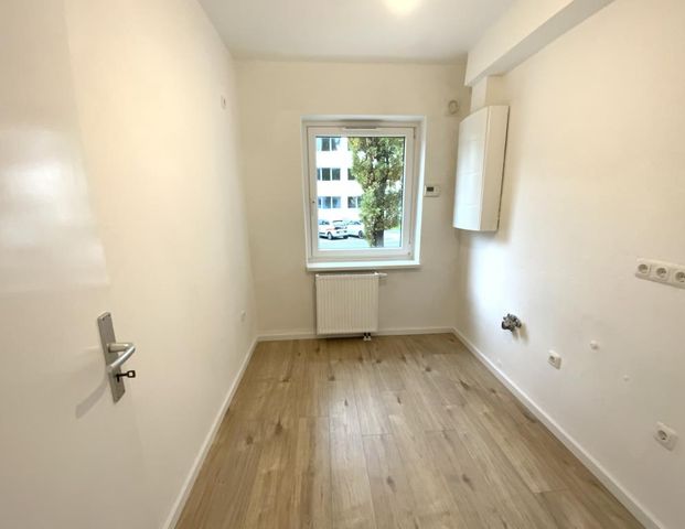 Renovierte Erdgeschoss-Wohnung mit Tageslichtbad frei! - Foto 1