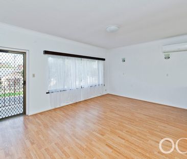 Open the Door To Effortless Living in a Central Western Location - Photo 1