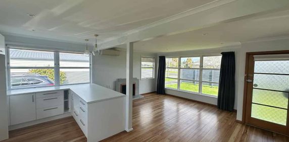 Charming Three-Bedroom Home with Single Garage - Photo 2