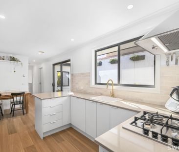 Stunning fully renovated two bedroom unit in quiet location. - Photo 6