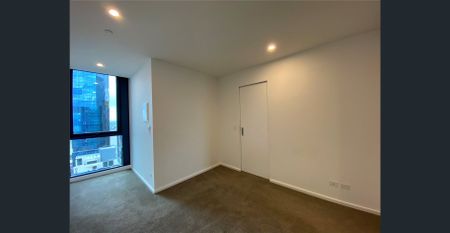 Experience this Luxurious 2 bedroom Apartment located in the "Melbourne Grand Building" - Photo 2