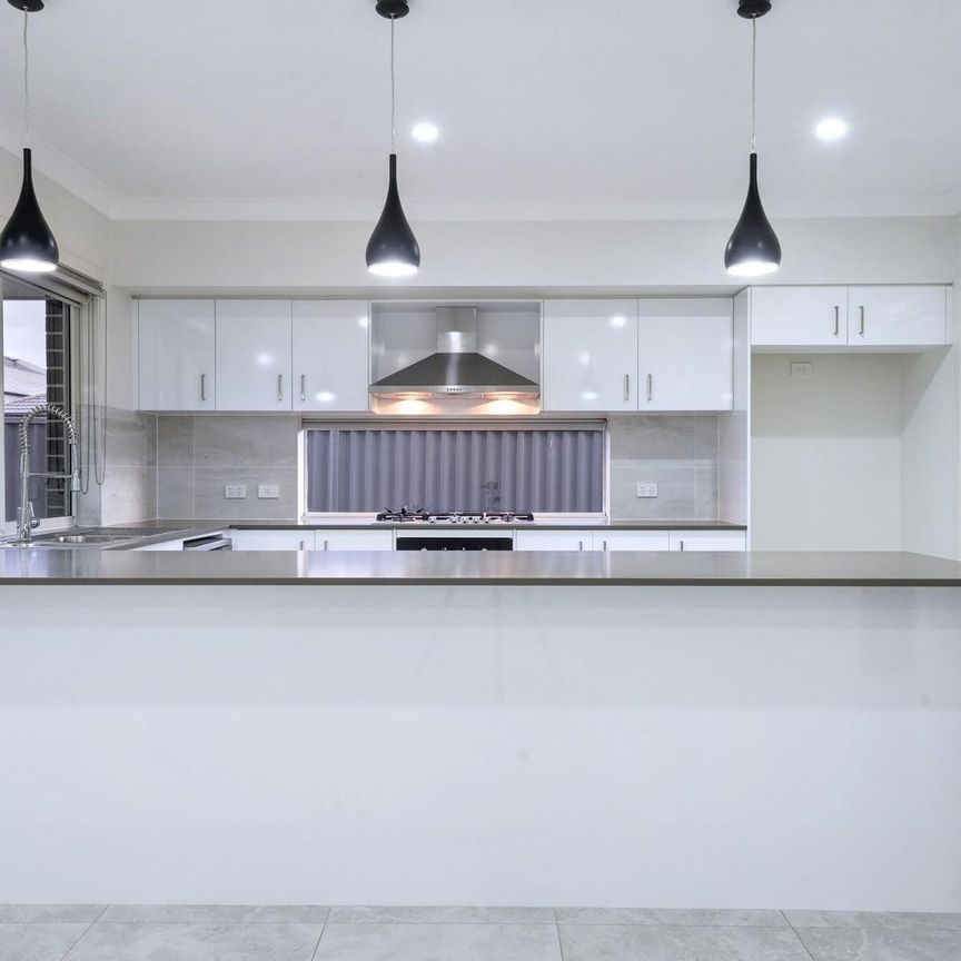 Neatly Presented Large Family Home - Photo 1