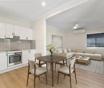 Renovated Three-Bedroom Upper-Level Unit - Photo 1