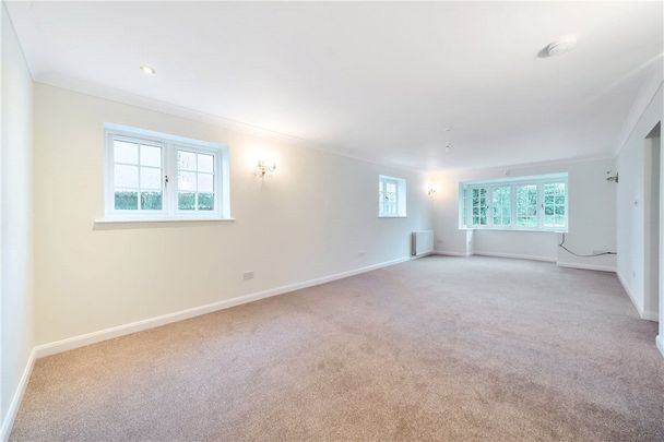 Wychwood is a detached four bedroom family home in South Heath, with a gravel driveway and well proportioned gardens to the front and rear. - Photo 1