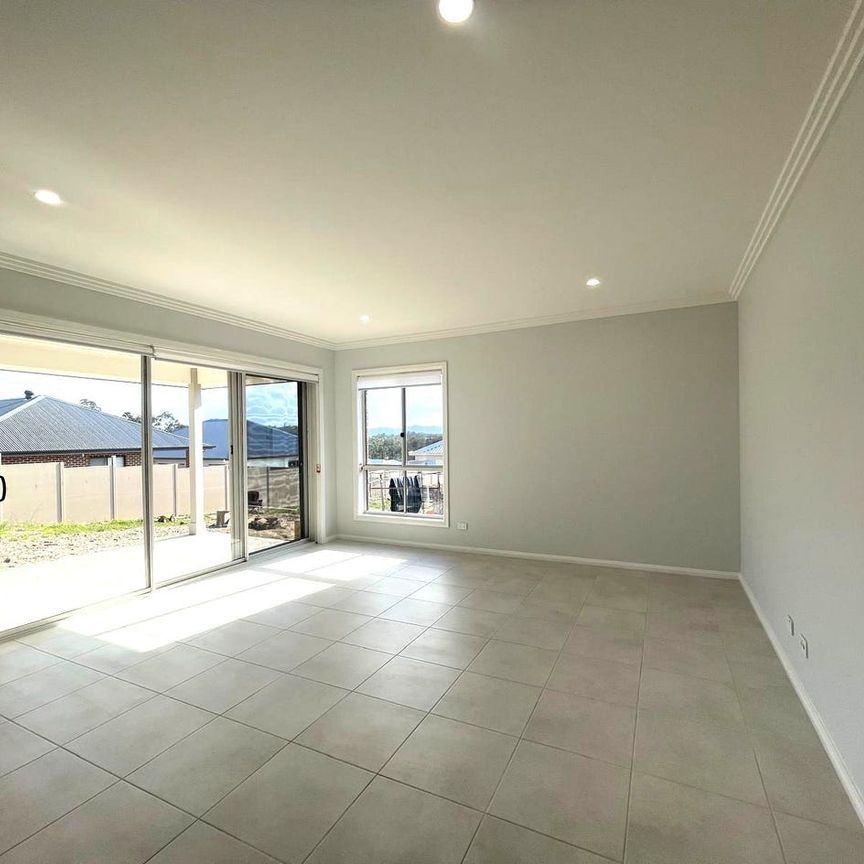 Brand New Modern Family Home with Space, Style & Comfort - Photo 1