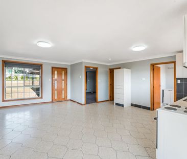 Neat and Tidy Three Bedroom Home on Large Block - Photo 4