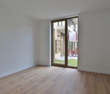 Nieuwbouwappartement met 1 slpk en autostaanplaats nabij centrum Be... - Photo 3