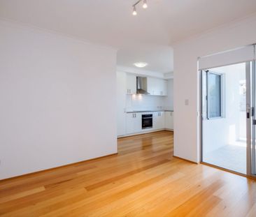 LOW-MAINTENANCE LIVING IN A BOUTIQUE COMPLEX - Photo 1