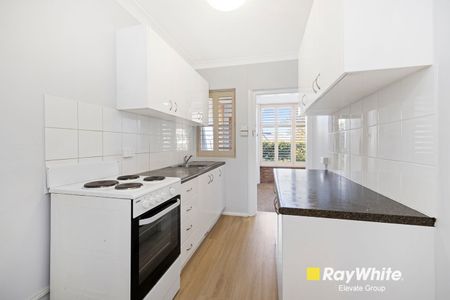 Spacious and Stylish Family Home with Sunroom and Large Backyard - Photo 3