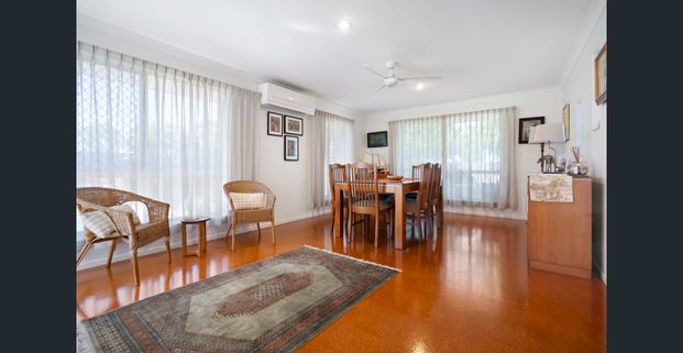 Stunning 4 Bedroom Home with A/C, Pool and 2 Street Access - Photo 1