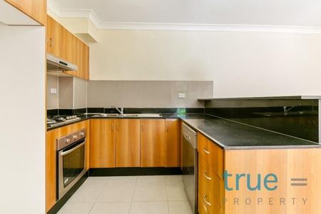 CONVENIENTLY LOCATED COURTYARD APARTMENT - Photo 3