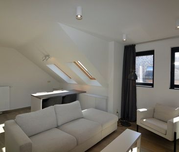 Modern, energiezuinig appartement met 2 slpk, terras en garage. - Photo 1