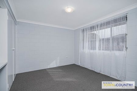 Two bedroom, bright unit must be inspected today! - Photo 3