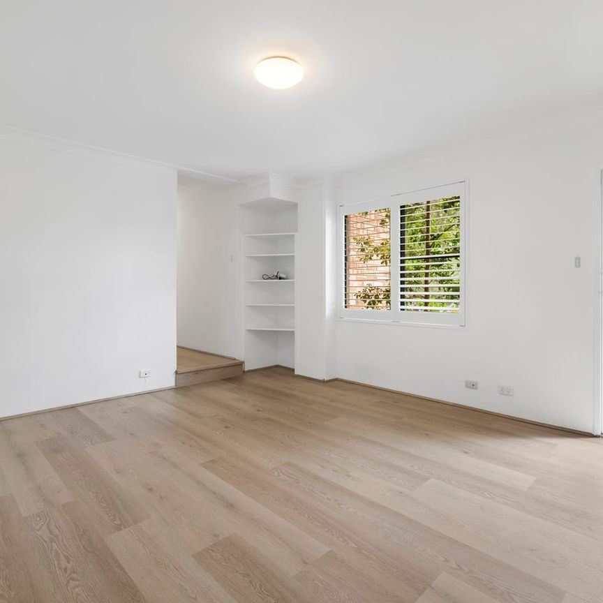 NEWLY RENOVATED NORTH-EAST UNIT WITH GROUND FLOOR ACCESS - Photo 1