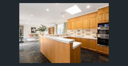 CHARMING VICTORIAN-INSPIRED HOME IN A BRIGHT, LOW MAINTENANCE GARDEN SETTING! - Photo 2