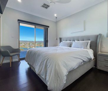 Furnished Coastal Retreat with Water Views & Modern Luxury - Photo 1