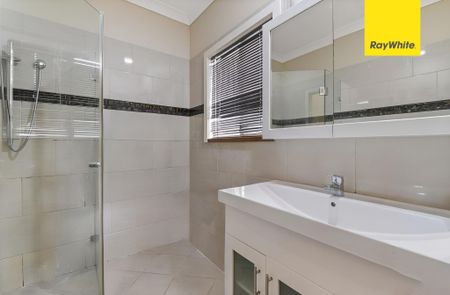 Spacious Property with Extensive Parking And Sheds Galore - Photo 5