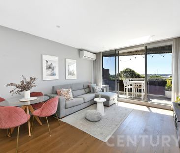 Elevated Luxury with Soaring Ceilings & Water Views - Photo 2