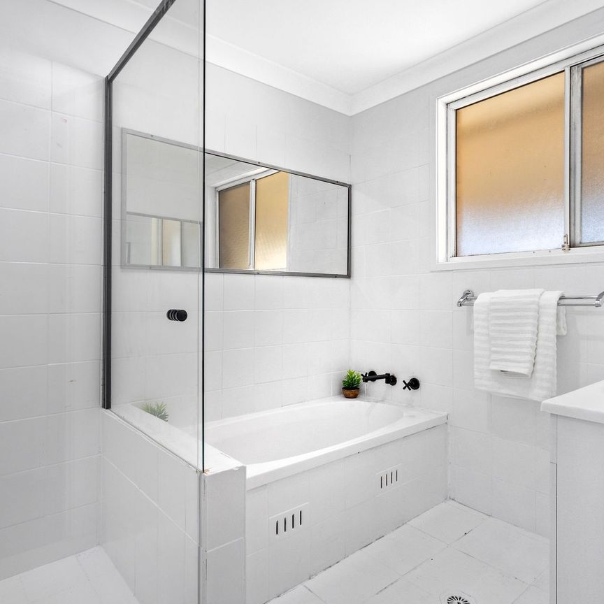 RENOVATED AND READY TO MOVE IN Three Bedroom Residence Close to All Amenities! - Photo 1