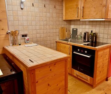 Gemütliche Wohnung mit viel Holz und alpinem Charm - Foto 4