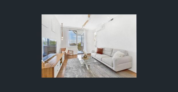 Spacious Three-Bedroom Apartment with Dual Balconies and Bay Views! - Photo 1