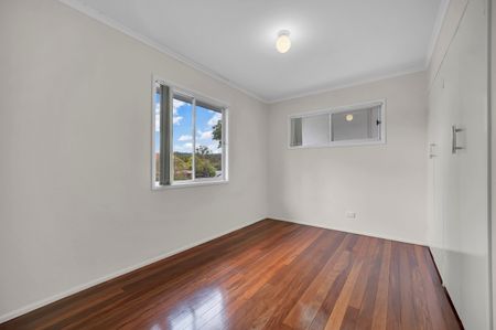 A charming home set on a generous block with a sprawling backyard. - Photo 4