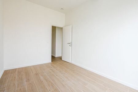 Nieuw, zuid-west gericht appartement gelegen vlakbij de Dumortierlaan. Inpandige parking te huur - Photo 5