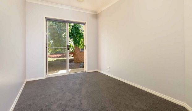 Cozy Home In A Sought After Location - Photo 1