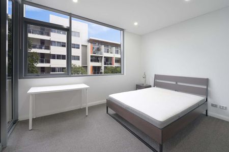 Contemporary 2-Bed Apartment I Furnished I Gym & Pool - Photo 4