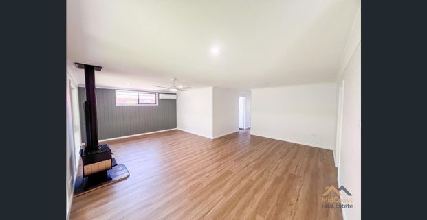 Charming 3-Bedroom Home - Photo 1