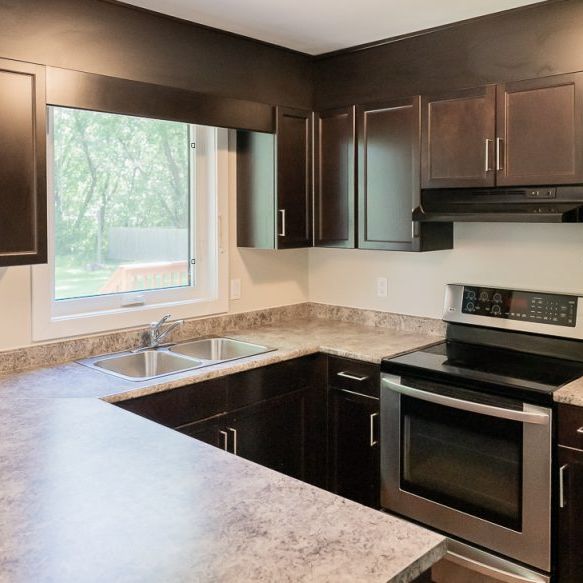 Stunning 3 Bedroom Home with Full Basement - Photo 1