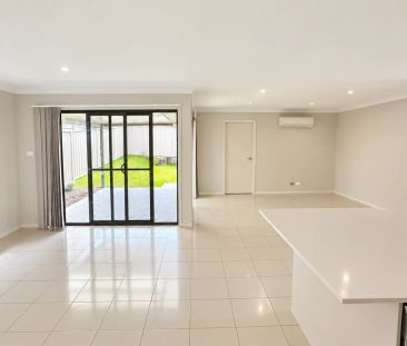EASY-CARE FAMILY LIVING WITH MODERN COMFORTS - Photo 4
