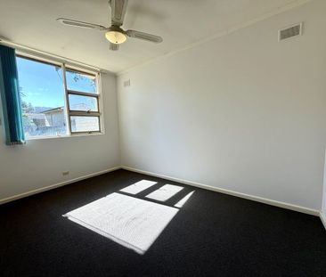 Spacious Family Home with Generous Yards in Prime Location! - Photo 4