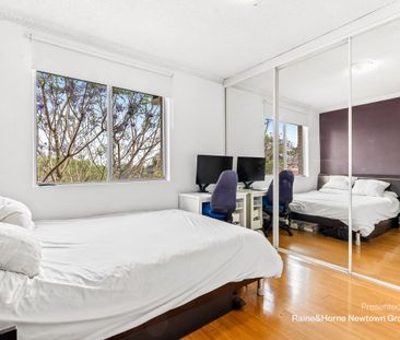 Convenient & Modern Two-Bedroom Apartment in Prime Location - Photo 2
