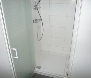 Een centraal gelegen appartement met 3 slaapkamers en terras - Photo 5