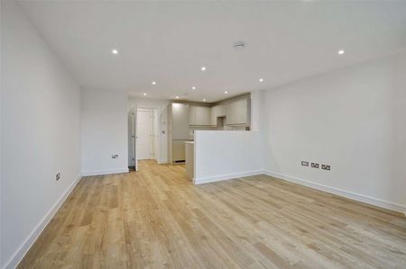 A brand new one bed apartment with one parking space offering light, modern interiors in a sought after location. - Photo 2
