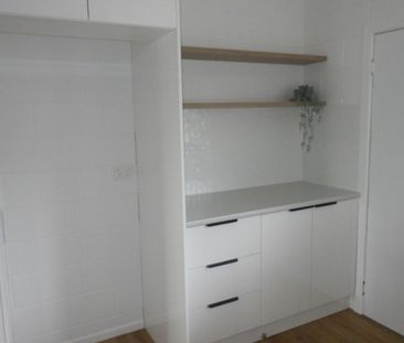 Fully renovated unit close to town. - Photo 5