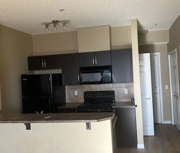 Cozy super convenient heated garage Condo | 1727 54 St SE, Calgary - Photo 1