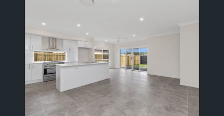 Brand New Home with Ducted AC & Media Room - Photo 2