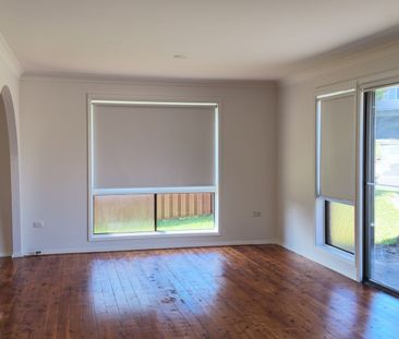 Family Home in Convenient Killarney Vale Location - Photo 1