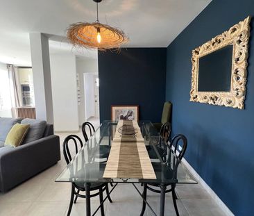 Trois pièces de 65m² avec plusieurs terrasses et un parking - Photo 2